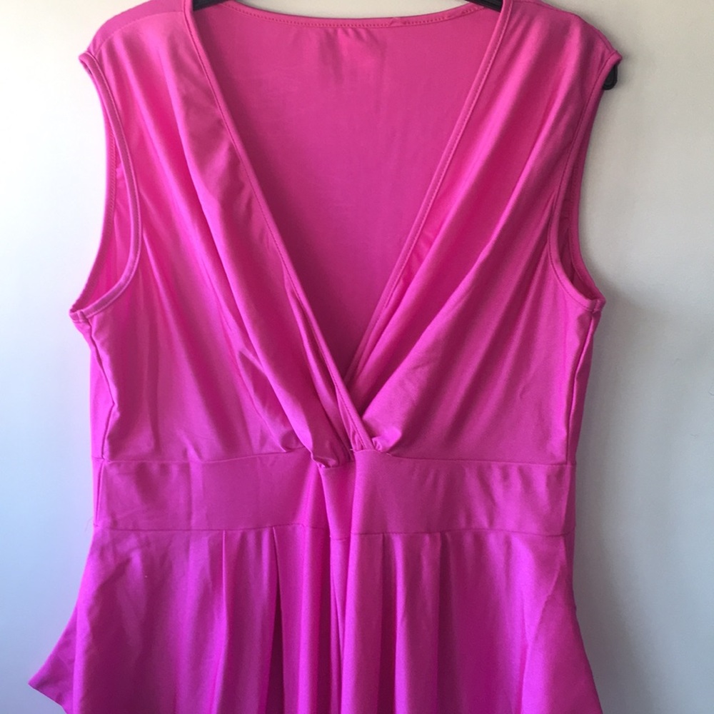 Pink jumpsuit.